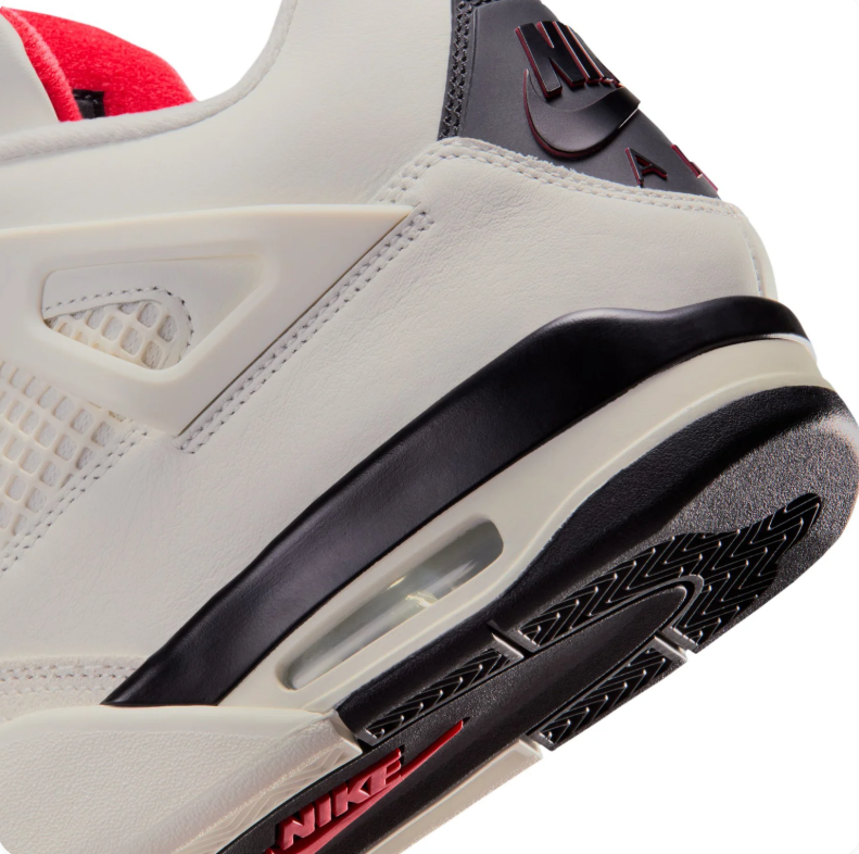 Jordan Off-White and Black Sneakers with Red Jumpman Accents