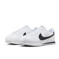 Nike White Low-Top Sneakers with Black Swoosh Details