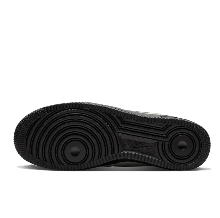 Nike Light Gray Low-Top Sneakers with Black Swoosh and Soles