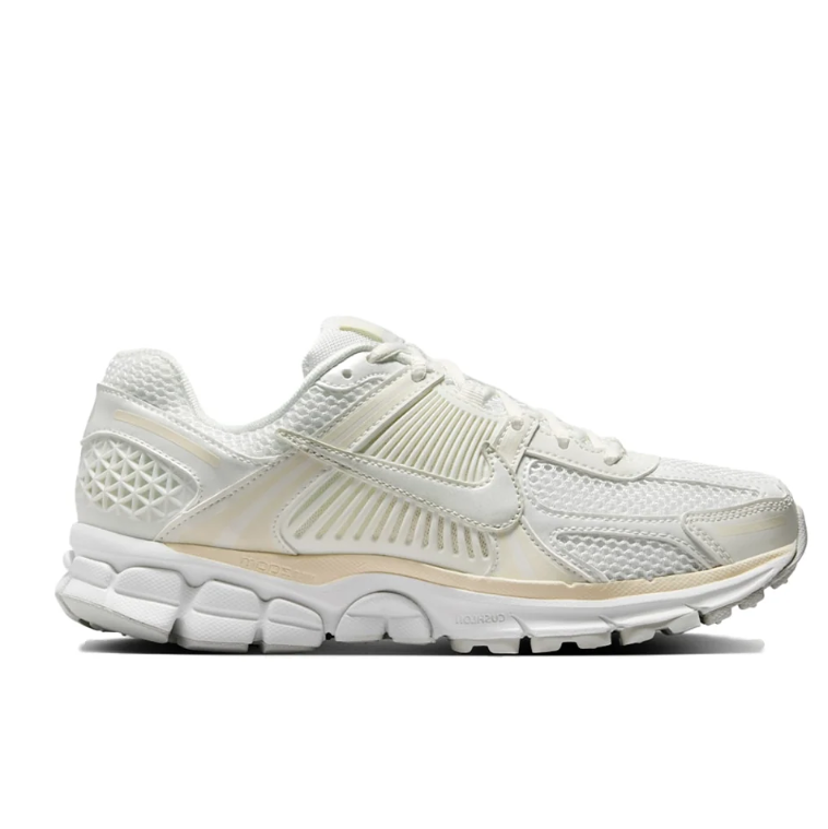 Nike Low-Top Sneakers – White and Cream with Sculpted Sole