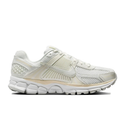 Nike Low-Top Sneakers – White and Cream with Sculpted Sole