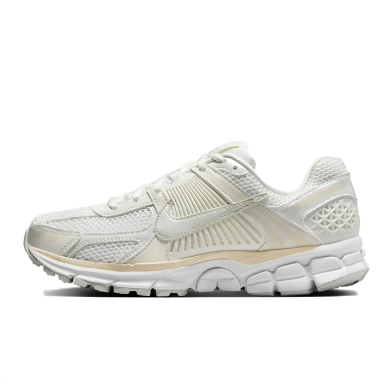 Nike Low-Top Sneakers – White and Cream with Sculpted Sole
