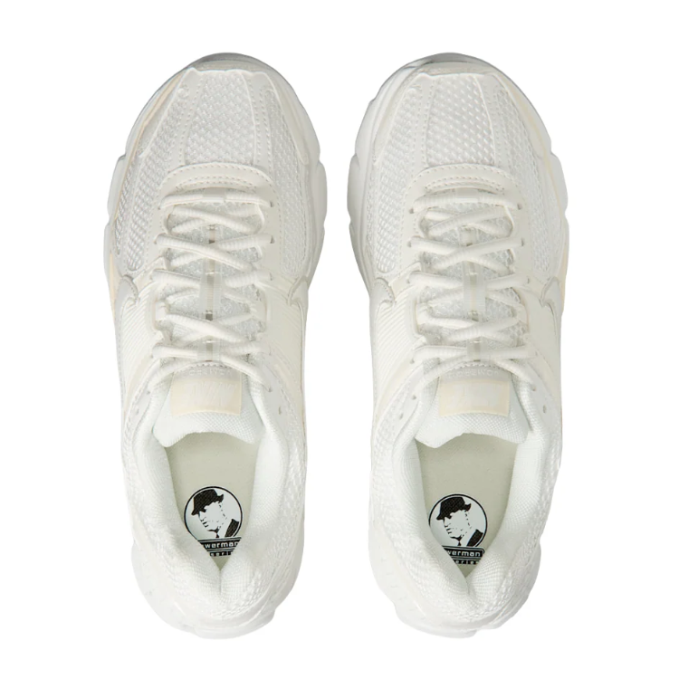 Nike Low-Top Sneakers – White and Cream with Sculpted Sole