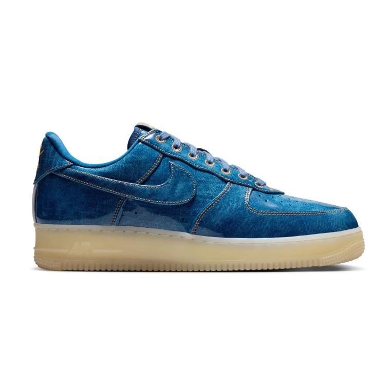 Nike Blue Low-Top Sneakers with Cream Soles and Metallic Eyelets