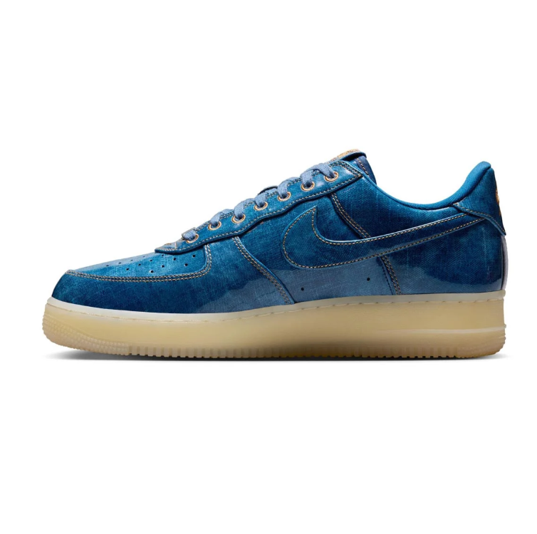 Nike Blue Low-Top Sneakers with Cream Soles and Metallic Eyelets